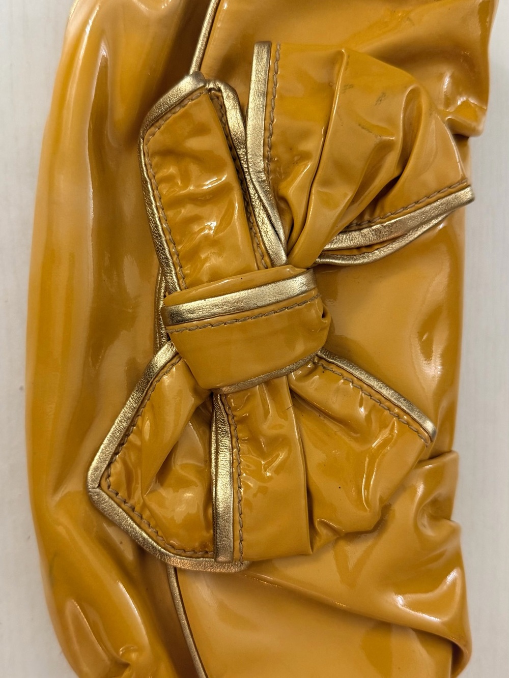Miu Miu Mustard Yellow Patent Bow Clutch. Authentic